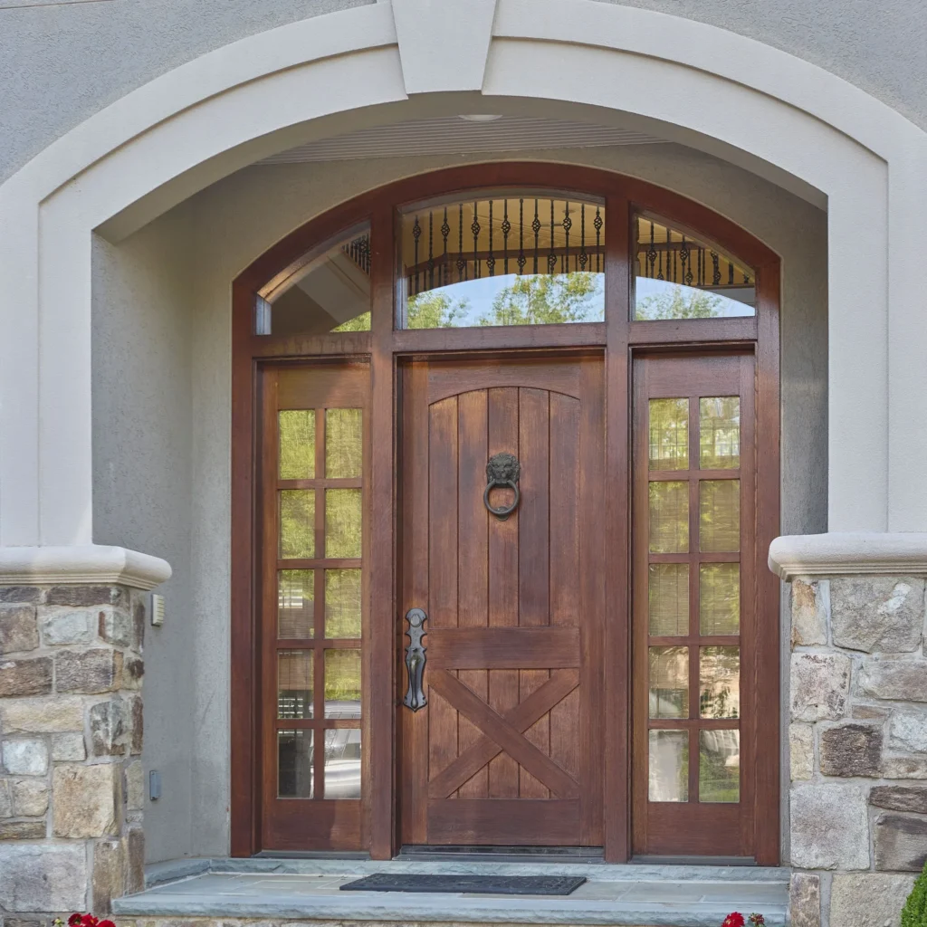 Arched wooden entry door and windows professionally installed by 4SeasonsHome in Rockville.
