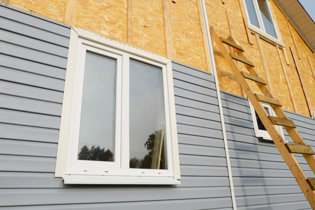 Grey Siding Windows Professional Installation Wip