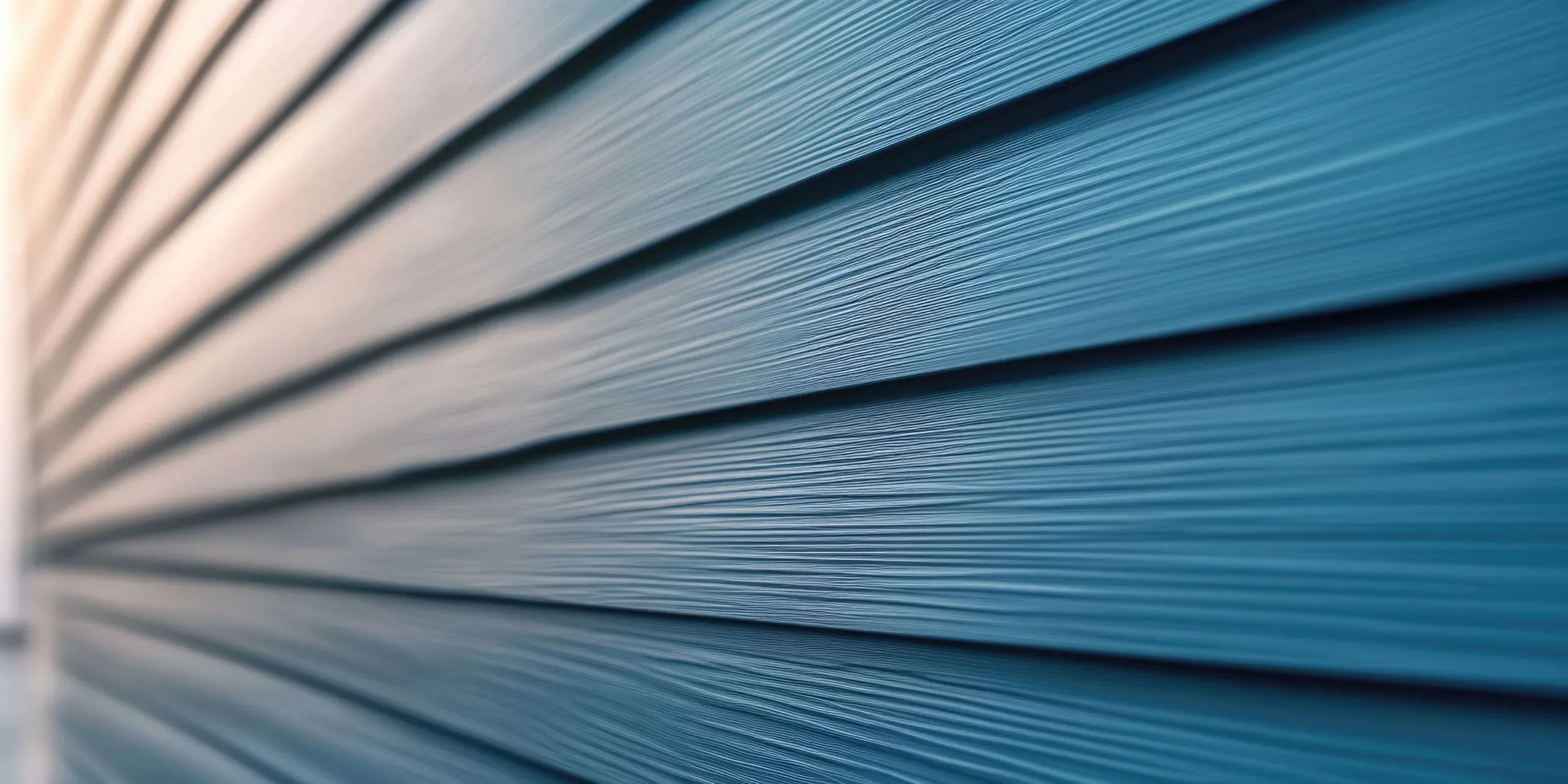 Blue vinyl siding installation in Rockville, MD