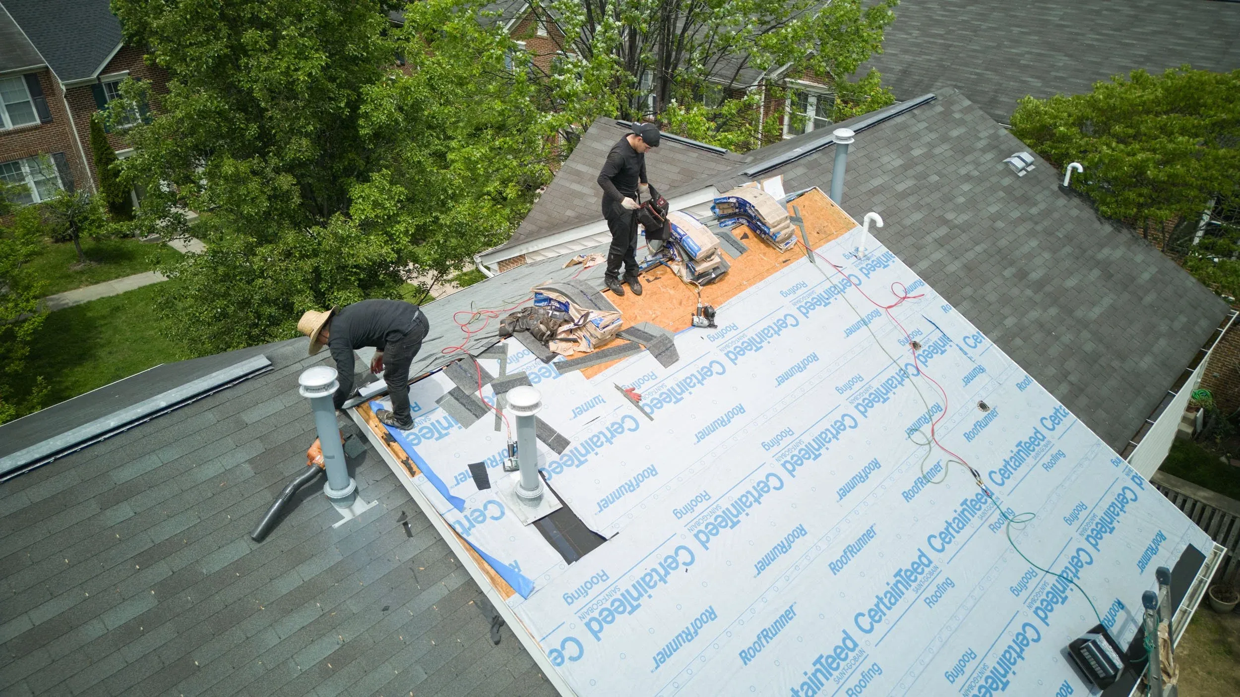 Four Seasons crew installing a CertainTeed-certified roof in the DMV