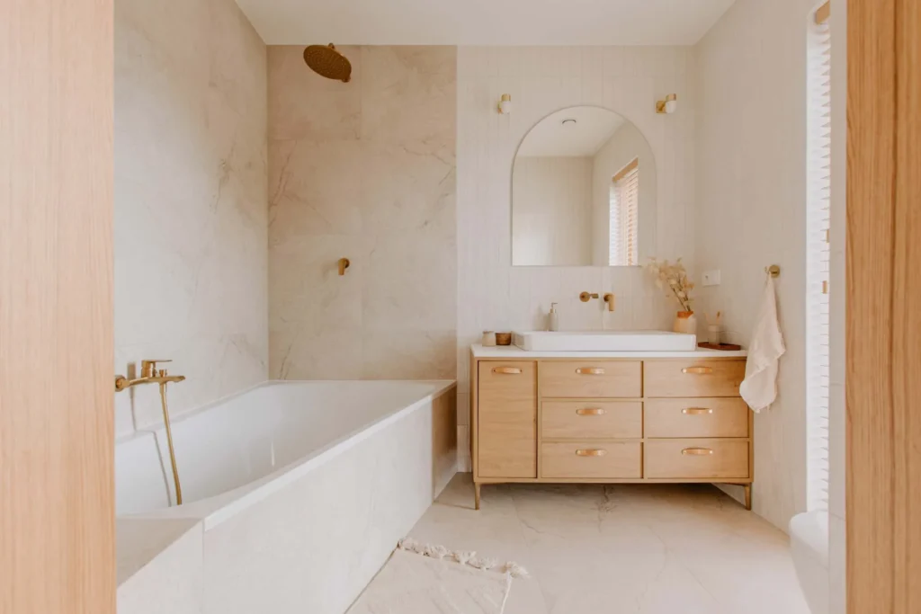 A functional and beautiful bathroom with light fixtures, faucet, and tiles that work for your personal style and lifestyle is easier to achieve than you may think with 4SeasonsHome's bathroom remodel service.