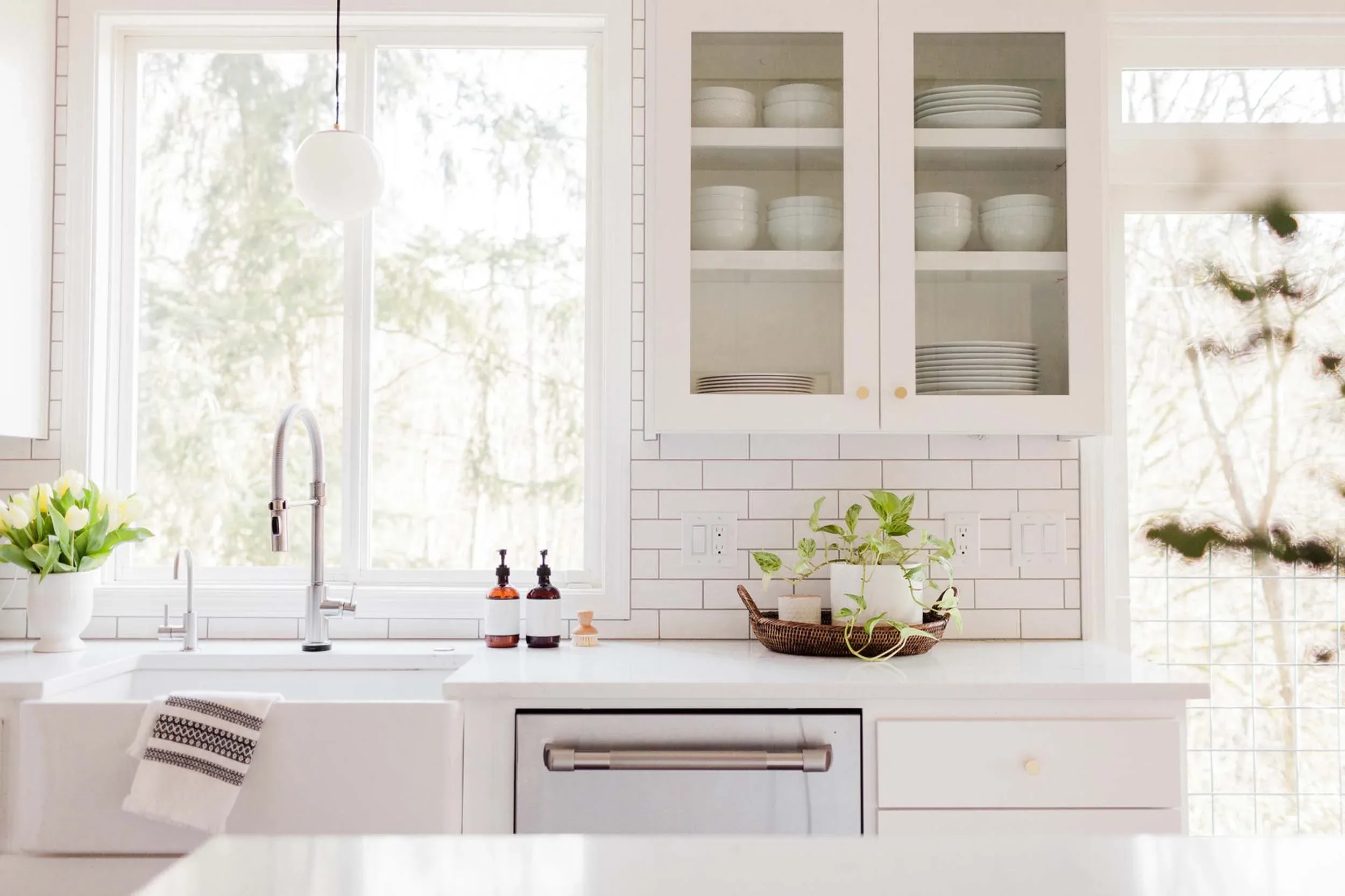 Renovated kitchen with white quartz counters